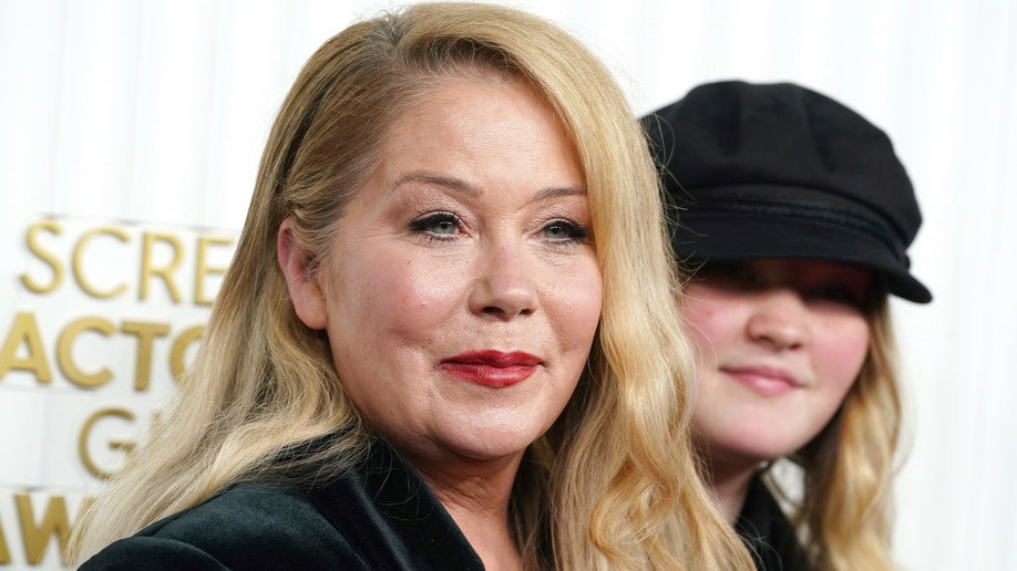 Christina Applegate and her daughter walking the red carpet