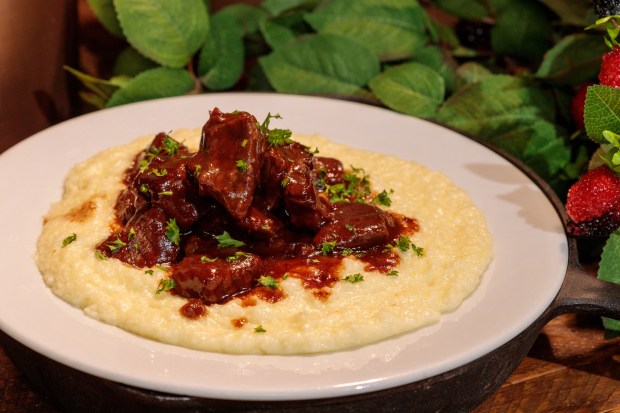 Boysenberry BBQ Beef Tips over Parmesan Grits with Green Onions at the Knott's Boyseberry Festival. (Knott's)