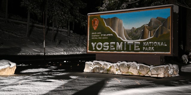 A welcome sign is seen as snow blanked Yosemite National Park in California, on Feb. 22, 2023. 