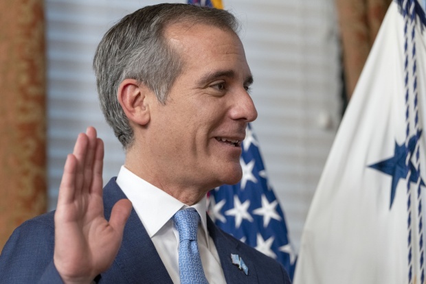 Eric Garcetti is sworn in as Ambassador to India by Vice President Kamala Harris, not pictured, Friday, March 24, 2023, in Harris' ceremonial office in the Eisenhower Executive Office Building on the White House complex in Washington. (AP Photo/Jacquelyn Martin)