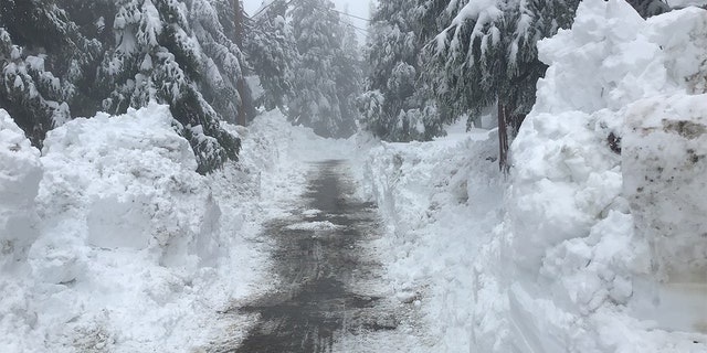 Snow drifts are seen in Lake Arrowhead, California, after a winter storm hit the area this week.