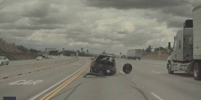 The white pickup truck appeared to pull over to the right-hand shoulder on the freeway.