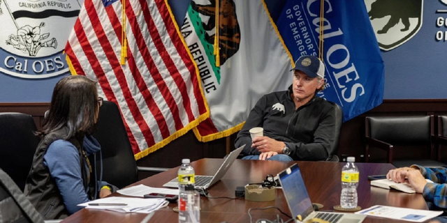 California Gov. Gavin Newsom is seen Sunday meeting with "emergency response officials" for "an update on winter storms and the state’s work to support disaster response and relief efforts," his office said.