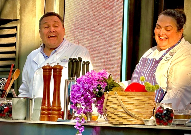 Disneyland resort president Ken Potrock, left, and Disneyland pastry sous chef Christina Orejel at the Disney California Adventure Food & Wine Festival. (Brady MacDonald/Orange County Register)