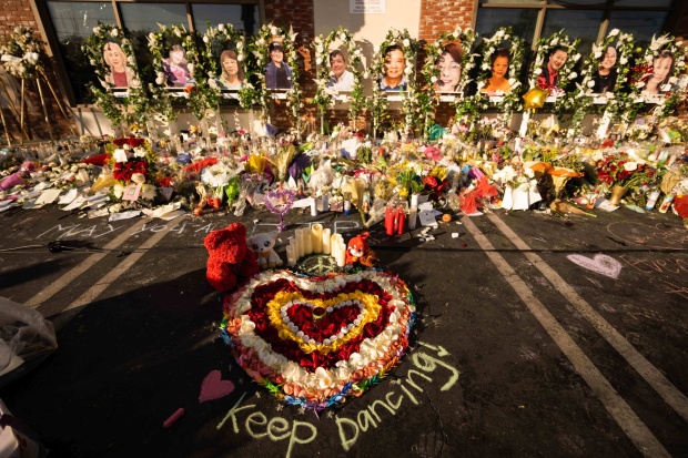 A heart out of wilted rose pedals sits for the Monterey Park mass shooting victims on Tuesday, January 31, 2023 at Star Ballroom Dance Studio. (Photo by Sarah Reingewirtz, Los Angeles Daily News/SCNG)