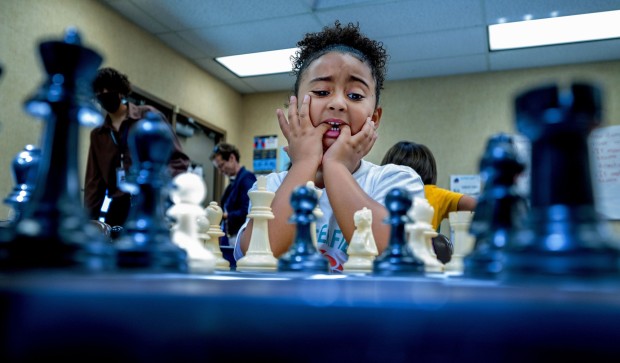 Myah Settle ponders her move as she plays chess against Noah Melendez at Butterfield Elementary School in Moreno Valley on Wednesday, July 13, 2022. (Photo by Terry Pierson, The Press-Enterprise/SCNG)