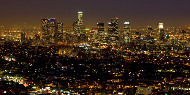 A nighttime view of the Los Angeles skyline from the Griffth Observatory, located on the southern slope of Mount Hollywood in Griffith Park, just above the Los Feliz neighborhood.