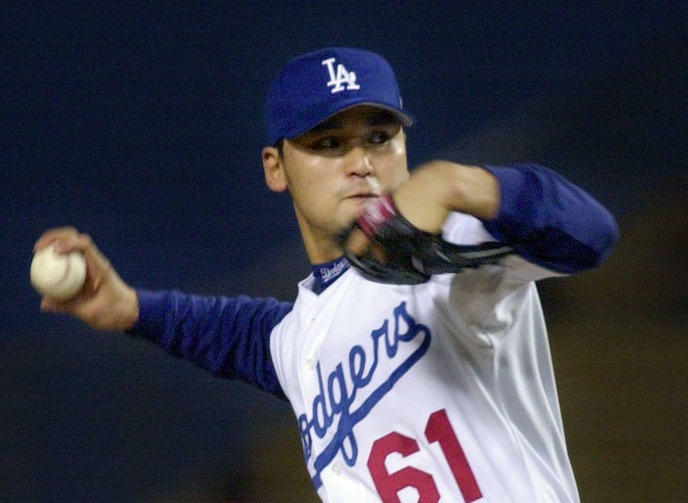 Los Angeles Dodgers' Chan Ho Park throws to the plate during the first inning against the Arizona Diamondbacks, Thursday night, Sept. 20, 2001, in Los Angeles. (AP Photo/Mark J. Terrill)