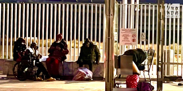 People inhabit encampments on the streets of San Francisco's Tenderloin District.