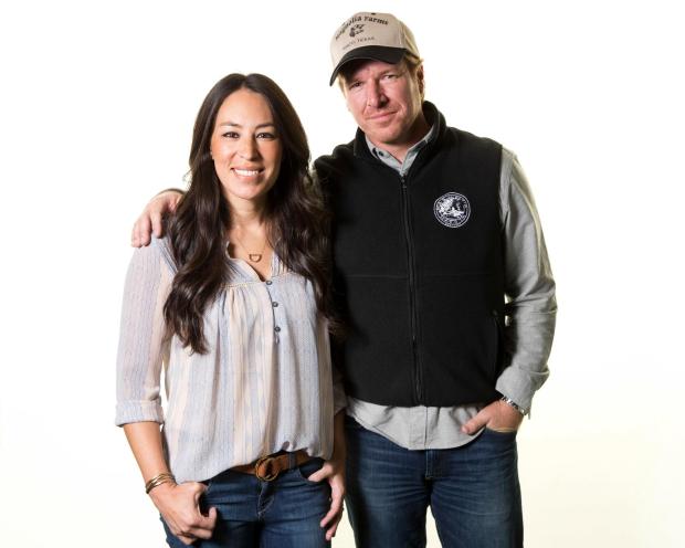 In this March 29, 2016 file photo, Joanna Gaines, left, and Chip Gaines pose for a portrait in New York. The couple made a name for themselves thanks to their knack for renovating homes. Now they're making the transition to TV executives with the July 15 launch of the first step toward their Magnolia Network, featuring dozens of hours of new unscripted content and archive shows. (Photo by Brian Ach/Invision/AP, File)