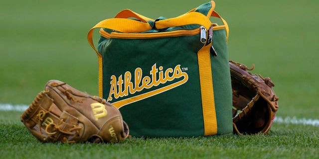 Oakland Athletics gear on the grass before a game against the Baltimore Orioles at Oriole Park at Camden Yards April 10, 2023, in Baltimore. 