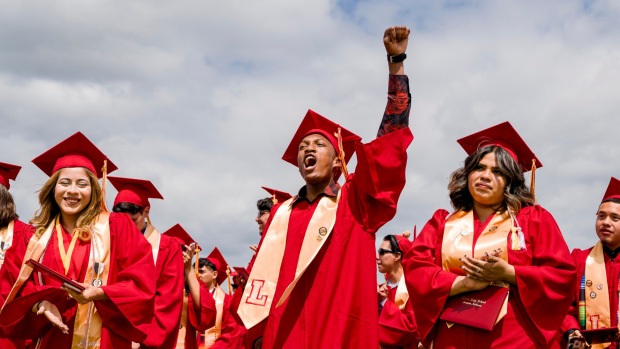 Emmitt McQuarters, center, raises a fist in celebration at the conclusion of the Loara High School graduation ceremonies in Handel Stadium at Western High School in Anaheim on Thursday, May 25, 2023. (Photo by Leonard Ortiz, Orange County Register/SCNG)