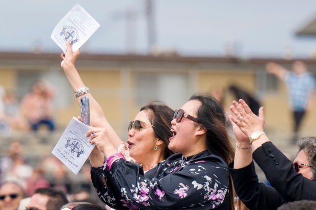 Family hoot and holler as their graduate's name is called out during the Loara High School graduation ceremonies in Handel Stadium at Western High School in Anaheim on Thursday, May 25, 2023. (Photo by Leonard Ortiz, Orange County Register/SCNG)