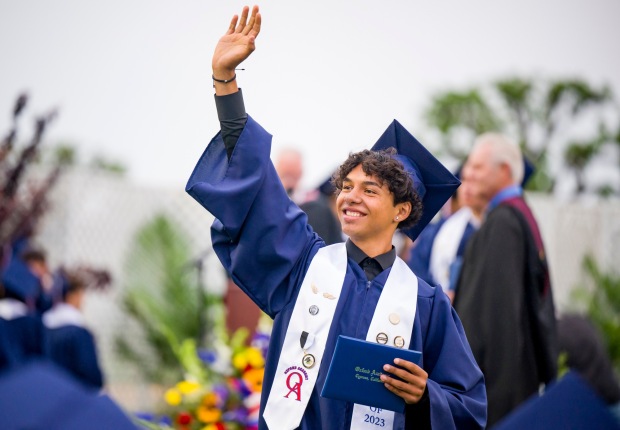 A graduate celebrates after receiving his diploma during the Oxford Academy graduation ceremonies in Handel Stadium at Western High School in Anaheim on Tuesday, May 23, 2023. (Photo by Leonard Ortiz, Orange County Register/SCNG)