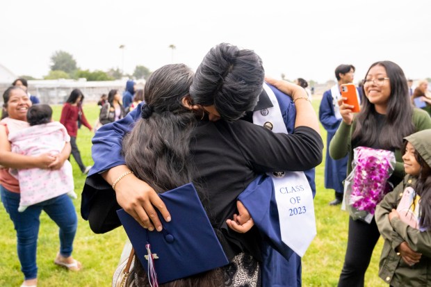 An emotional Angel Hernandez hugs his mother Virginia after the Oxford Academy graduation ceremonies in Handel Stadium at Western High School in Anaheim on Tuesday, May 23, 2023. (Photo by Leonard Ortiz, Orange County Register/SCNG)