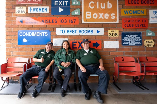 From left, Eddie Vidana, Gina Dominguez, and Rick Angona on the Top Deck at Dodger Stadium on Wednesday, May 31, 2023. Eddie is the captain of the Top Deck crew, who are all long-time ushers in that part of the stadium, which is where they like it. (Photo by David Crane, Los Angeles Daily News/SCNG)