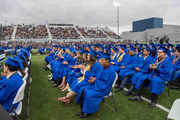 Senior students applaud a speech during the La Habra High School graduation ceremony on Wednesday, May 31st, 2023. (Photo by Michael Ares, Contributing Photographer)