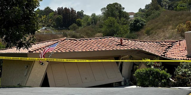 Crime scene tape outside of Rolling Hills Estates home