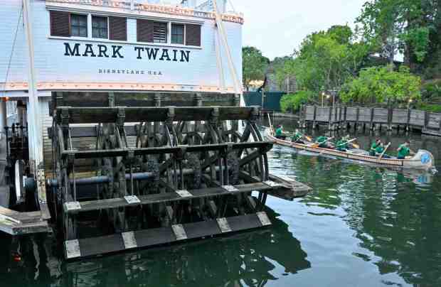 A team competes in the Disneyland Resort Canoe Races in the Rivers of America inside Disneyland in Anaheim, CA, on Thursday, August 10, 2023. (Photo by Jeff Gritchen, Orange County Register/SCNG)