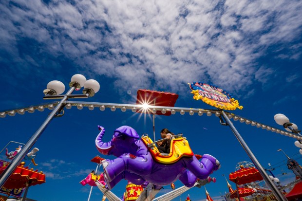 Children ride the Dumbo ride in Kid Land at the OC Fair in Costa Mesa on Thursday, August 10, 2023. Kid Land is one of the Top 10 things visitors should do before the end of the OC Fair on Sunday, Aug. 13. (Photo by Leonard Ortiz, Orange County Register/SCNG)