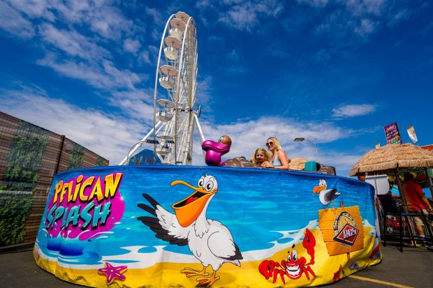 Jenna Barnett and daughter Lucy, 7, ride the Pelican Splash ride in Kid Land at the OC Fair in Costa Mesa on Thursday, August 10, 2023. Kid Land is one of the Top 10 things visitors should do before the end of the OC Fair on Sunday, Aug. 13. (Photo by Leonard Ortiz, Orange County Register/SCNG)