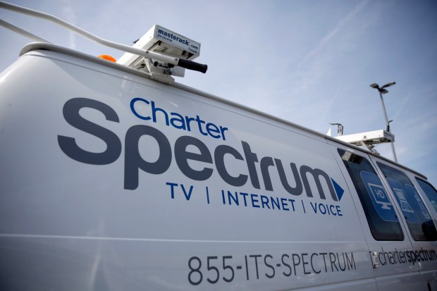 Full-time employees at Spectrum now can get 100% of tuition costs covered for certain degrees and certificates in a new Charter Education Benefit program. (AP Photo/Jeff Roberson)