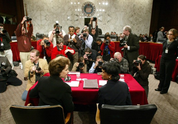 National Security Adviser Condoleezza Rice (L) President Bush's Secretary of State nominee, talks with Sen. Diane Feinstein (D-CA) prior to her confirmation hearing before the Senate Foreign Relations Committee in Washington D.C. on January 18, 2005. (Matthew Cavanaugh/Getty Images)