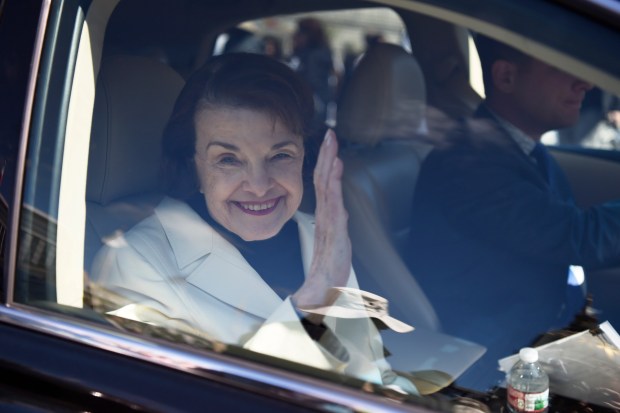 U.S. Senator Dianne Feinstein waves as she leaves the Civic Center during a March For Our Lives rally in San Francisco, Calif., on Saturday, March 24, 2018. (Jose Carlos Fajardo/Staff Archives)