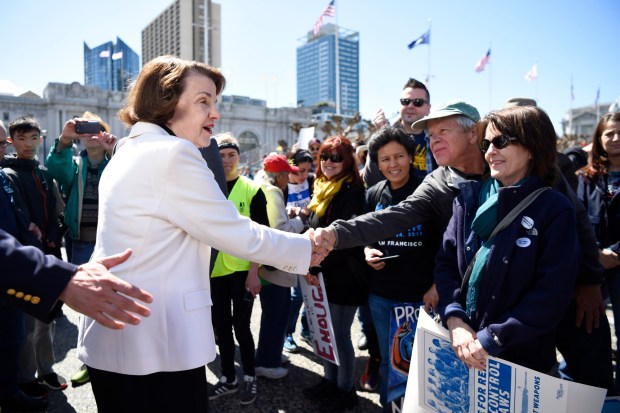 U.S. senator Dianne Feinstein shakes hands with people at Civic Center during a March For Our Lives rally in San Francisco, Calif., on Saturday, March 24, 2018. (Jose Carlos Fajardo/Staff Archives)