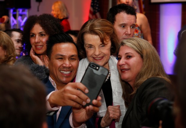 U.S. Senator Dianne Feinstein poses for selfies with supporters at her election night party in San Francisco, Calif., on Tuesday, November 6, 2018. (Karl Mondon/Staff Archives)