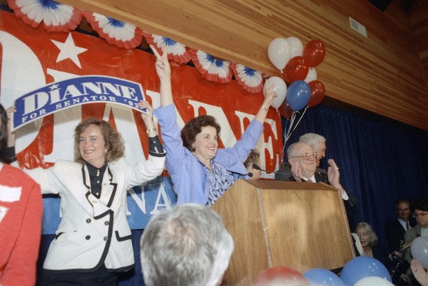 FILE - Former San Francisco Mayor Dianne Feinstein celebrates in San Francisco, Tuesday, June 8, 1992, after announcing her victory for one of California's U.S. Senate seats. Democratic Sen. Dianne Feinstein of California has died. Three people familiar with the situation confirmed her death to The Associated Press on Friday, Sept. 29, 2023. She was 90.(AP Photo/George Nikitin, File)