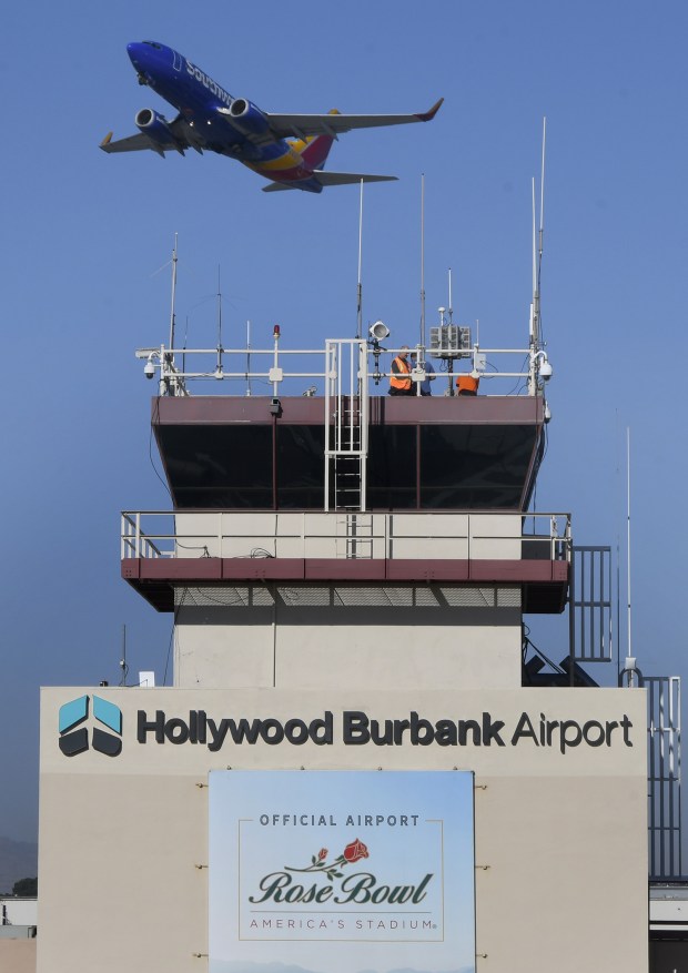 Hollywood Burbank Airport unveiled its new logo and name on the façade of the terminal tower. The event was attended by Burbank-Glendale-Pasadena Airport Authority officials as well as City Council Members from Burbank. After the unveiling the Airport introduced its new pet therapy program, Traveler's Tails, providing stress relief and comfort for passengers through interaction withcertified therapy dogs. Burbank, CA 12/14/2017 (Photo by John McCoy, Los Angeles Daily News/SCNG)