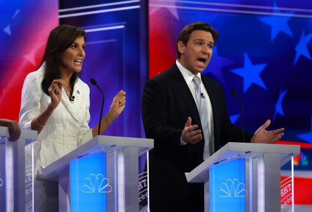 MIAMI, FLORIDA - NOVEMBER 08: Republican presidential candidates former U.N. Ambassador Nikki Haley and Florida Gov. Ron DeSantis participate in the NBC News Republican Presidential Primary Debate at the Adrienne Arsht Center for the Performing Arts of Miami-Dade County on November 8, 2023 in Miami, Florida. Five presidential hopefuls squared off in the third Republican primary debate as former U.S. President Donald Trump, currently facing indictments in four locations, declined again to participate. (Photo by Joe Raedle/Getty Images) *** BESTPIX ***