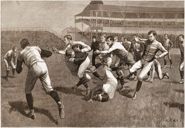 A wood engraving from "Once a Week" magazine shows the on-field action during a football match between Yale and Princeton, in the late 19th century.(Stock Montage/Archive Photos/Getty Images)