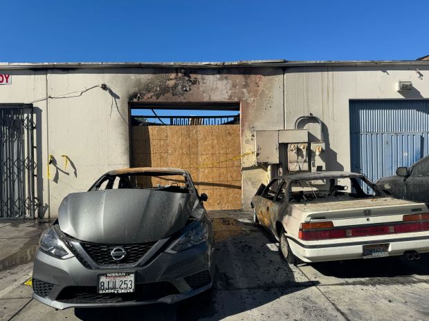 The owner of the business, Tu Nguyen, said several workers were inside when the fire began at the back of the building but had managed to escape without injuries. The blaze also destroyed three vehicles parked behind the building. (Photo by Mona Darwish)