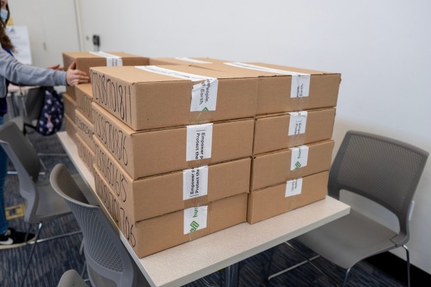 Boxes with computers in them wait to be distributed. Veterans received free laptop computers at San Fernando Library on Friday, Dec. 22, 2023. The County of Los Angeles distributed 1,000 Laptops to Military Veterans Impacted by the Digital Divide. Delete The Divide is an initiative led by the County of Los Angeles to advance digital equity in underserved communities. The initiative includes a range of support programs and services, including issuing laptops to households in need. (Photo by Hans Gutknecht, Los Angeles Daily News/SCNG)