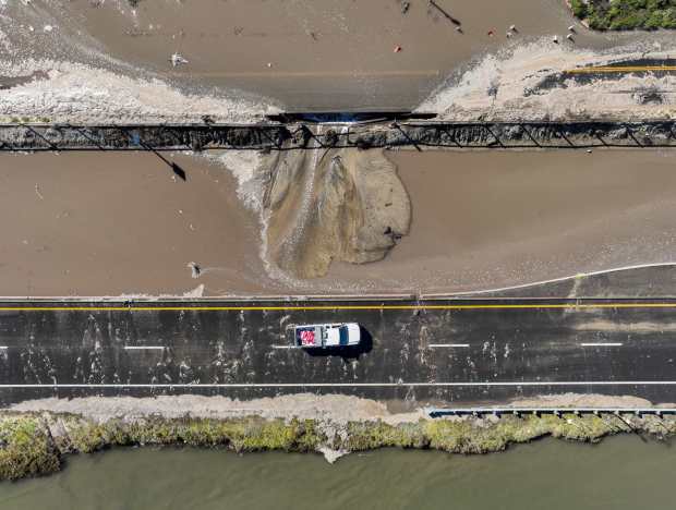 High tides cause flooding on Pacific Coast Highway at Bolsa Chica State Beach in Huntington Beach, CA, on Tuesday, January 24, 2023. (Photo by Jeff Gritchen, Orange County Register/SCNG)