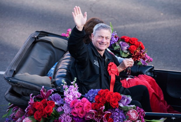 2018 Tournament of Roses Grand Marshal Gary Sinise, actor and humanitarian, waves to spectators along Colorado Boulevard, during the 2018 Rose Parade in Pasadena on Monday, Jan. 1, 2018. (Photo by Ed Crisostomo, Los Angeles Daily News/SCNG)