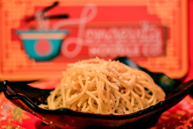 Long noodles tossed in zest garlic butter with parmesan in California Adventure available at Longevity Noodle Company Marketplace during the Lunar New Year at the Disneyland Resort in Anaheim, CA, on Friday, January 21, 2022. (Photo by Jeff Gritchen, Orange County Register/SCNG)