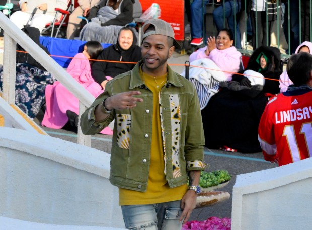 Musician Alexander Star stands atop the Visit Lauderdale float xe2x80x9cEveryone Under the Sunxe2x80x9d winner of the Past President Award during the 135th Rose Parade in Pasadena on Monday, Jan. 1, 2024. (Photo by Libby Cline-Birmingham, Contributing Photographer)