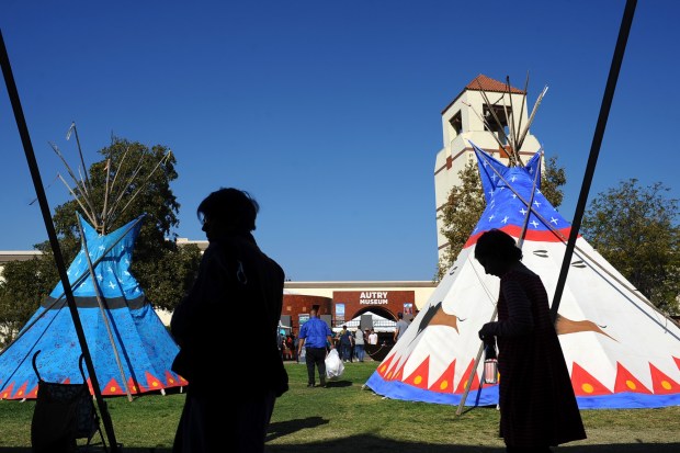 Teepees make up part of the American Indian Arts Marketplace at the Autry Museum of the American West Sunday afternoon. The event featured Native American arts, crafts, dance and music. (Photo by Andy Holzman/Contributing photographer).