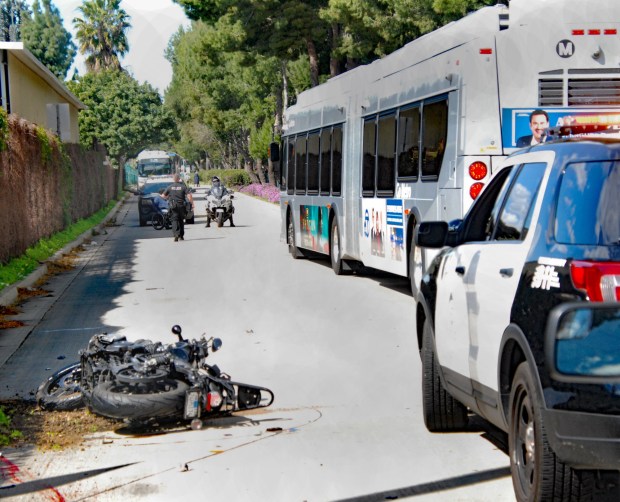 A Metro G Line bus and a motorcycle collided on Friday, March 15, 2024, on the busway at Hazeltine Avenue in the Van Nuys-Valley Glen area. The male motorcycle rider was killed, and his passenger ­-- a 12-year-old girl -- was critically injured. (Photo by Mike Meadows/Contributing Photographer)