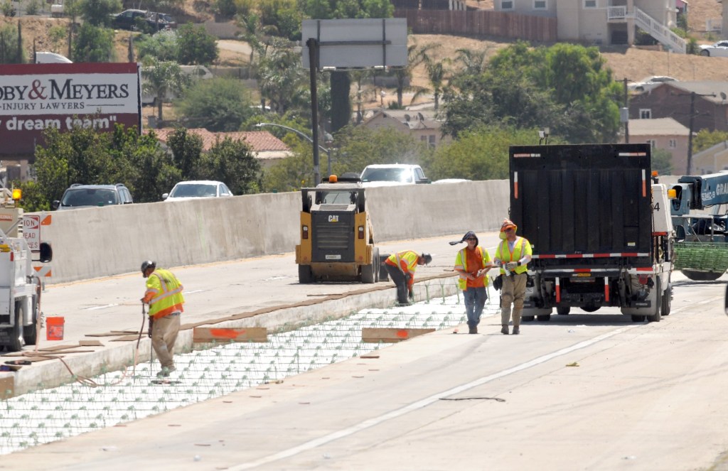 Asphalt or concrete lanes? Both are used on 405 Freeway and elsewhere ...