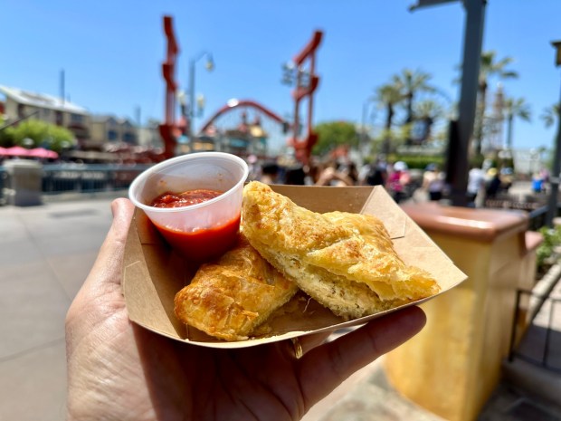 Pesto Chicken Handheld Pie available at Sonoma Terrace in Disney California Adventure during Pixar Fest. (Brady MacDonald/Orange County Register/SCNG)