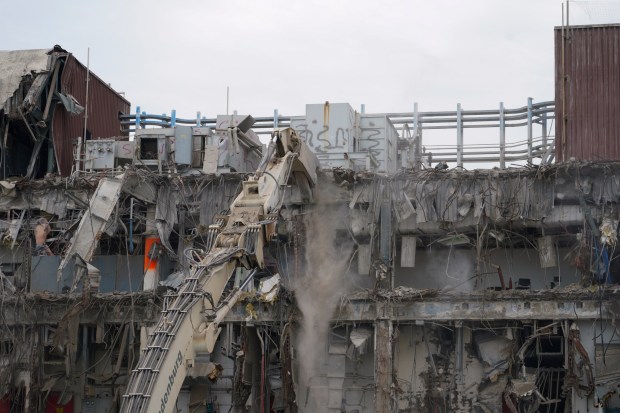 Excavators work on demolishing what was the control building at San Onofre Nuclear Power Plant on Thursday, Aug. 1, 2024, in San Diego County, CA. (Nelvin C. Cepeda / The San Diego Union-Tribune)