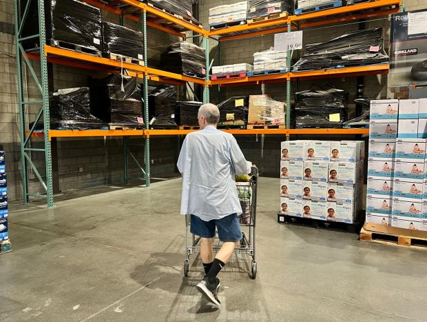 A man looks for paper towels and toilet paper at the Simi Valley Costco on Thursday, Oct. 3, 2024, as shoppers make a run on supplies, prompted by the Eastern and Gulf ports strike. (Photo by Dean Musgrove, Los Angeles Daily News/SCNG)